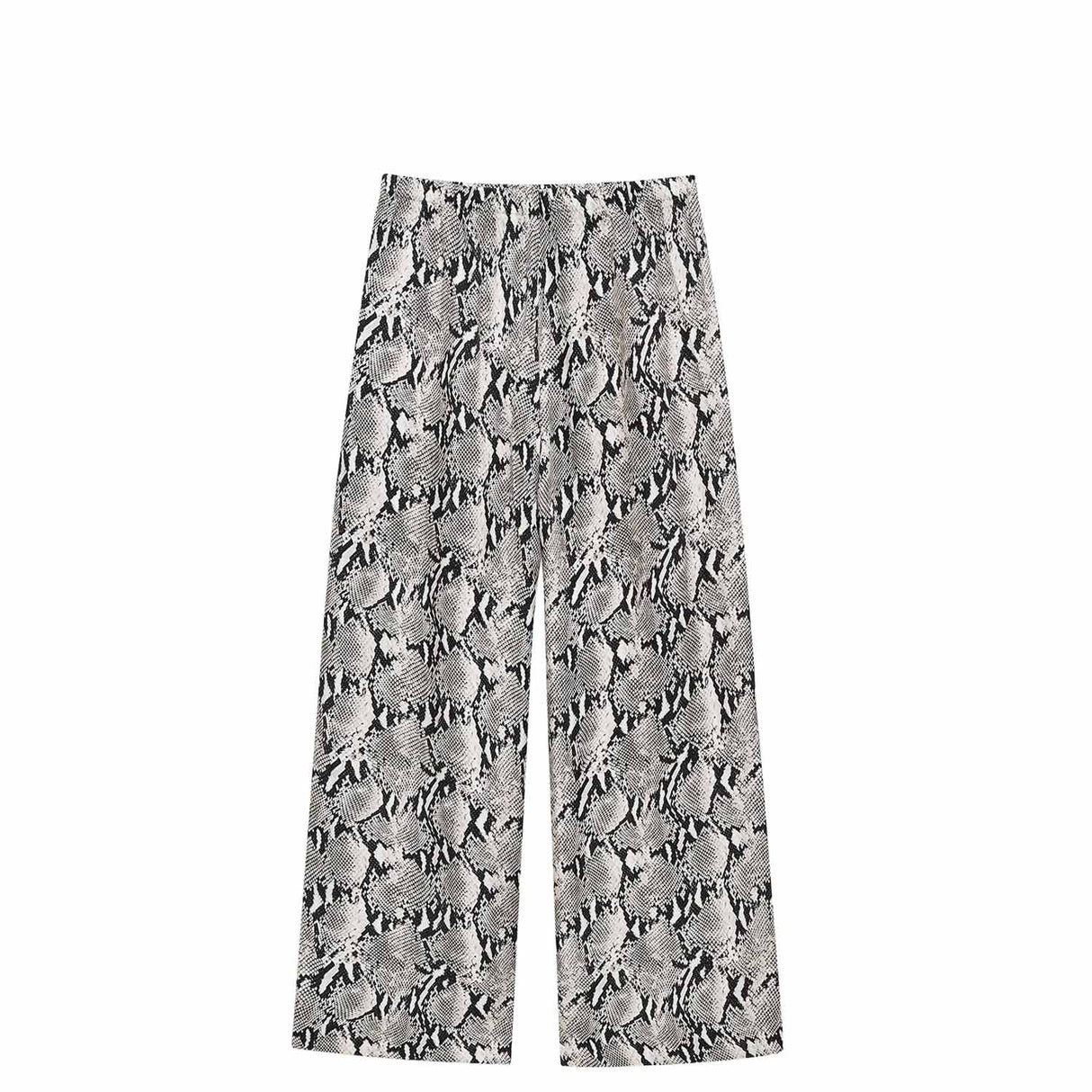 Trousers with a snake print pattern on a white background