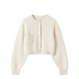 Cream-colored cardigan with a pocket on a white background