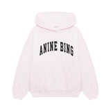 Pink hoodie with 'ANINE BING' text on a white background