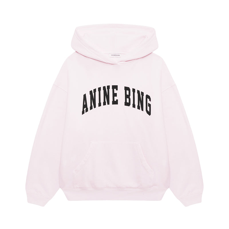 Pink hoodie with 'ANINE BING' text on a white background
