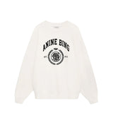 White sweatshirt with 'ANINE BING' logo on a white background