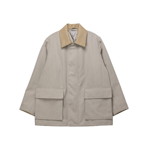 Beige jacket on a white bakground
