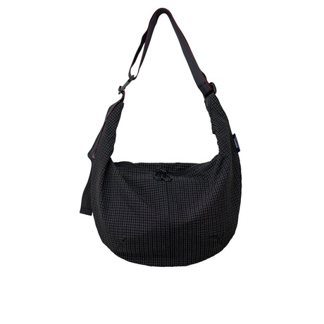 Black checkered shoulder bag on a white background