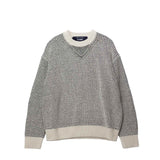 Black and white sweater on a white background