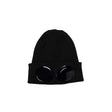 Black beanie with round eyelets on a white background