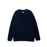 Navy blue sweater on a white background