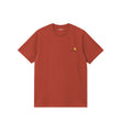 Red t-shirt with a small logo on a white background