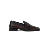 Brown loafers on a white background