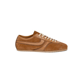 Brown sneaker with white laces on a white background