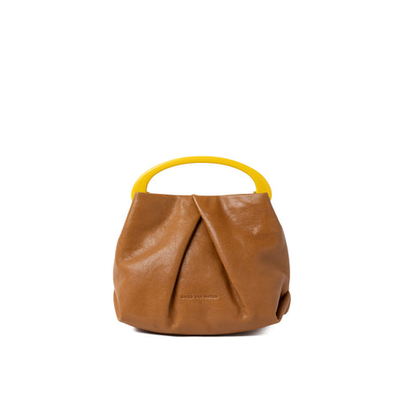 Brown leather handbag with a yellow handle on a white background