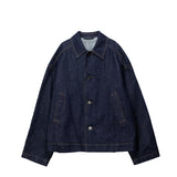 Dark blue denim jacket on a white background