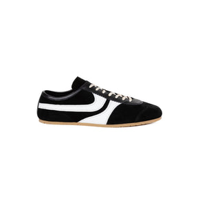 Black sneakers with a white detail on a white background.