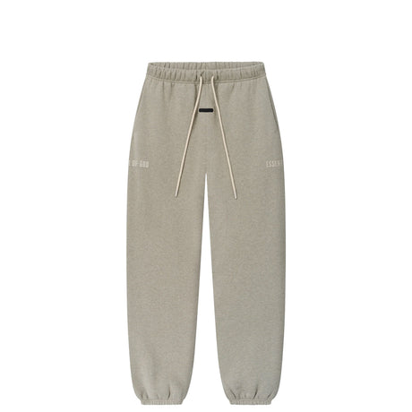 A pair of light gray heather sweatpants with an elastic waistband, matching drawstrings, and subtle tonal text graphics on the upper thighs, shown against a plain white background.