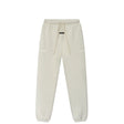Light beige heather sweatpants with an elastic waistband, beige drawstrings, and subtle white text graphics on the upper thighs, shown against a plain white background.