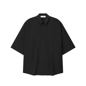 Black button up shirt on a white background
