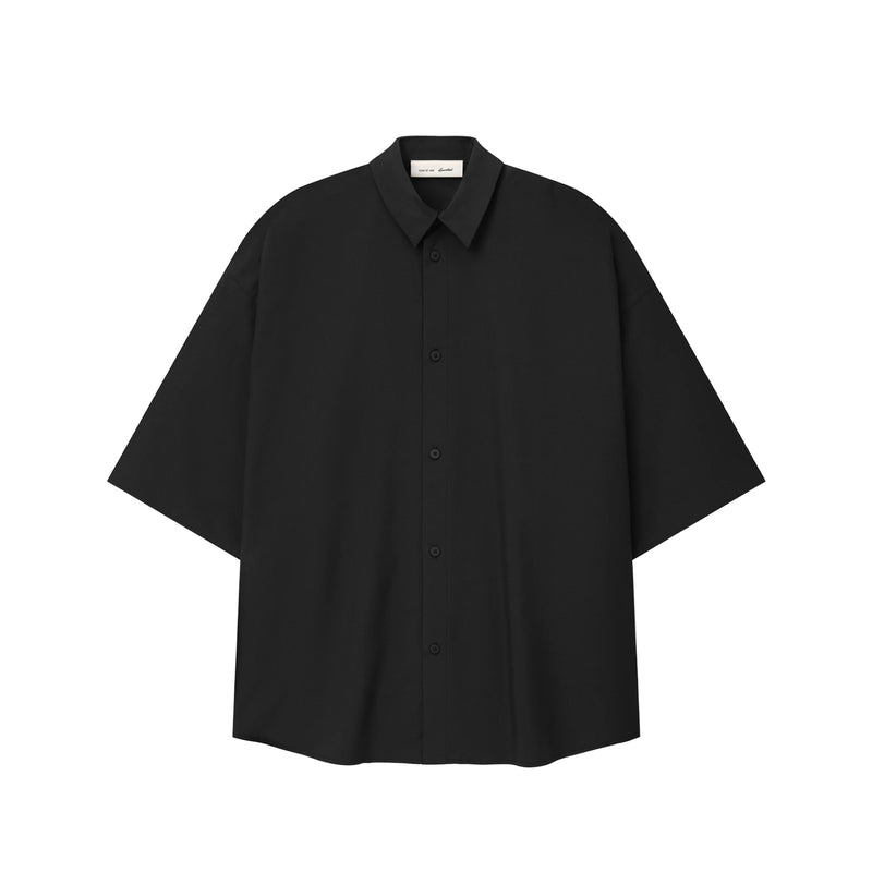 Black button up shirt on a white background