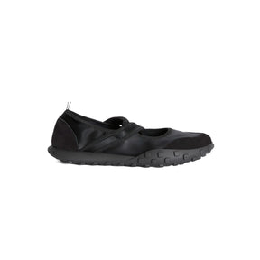 Black ballerina sneaker on a white background