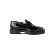 Black loafer on a white background
