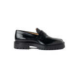Black loafer on a white background