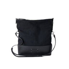 Black shoulder bag on a white background