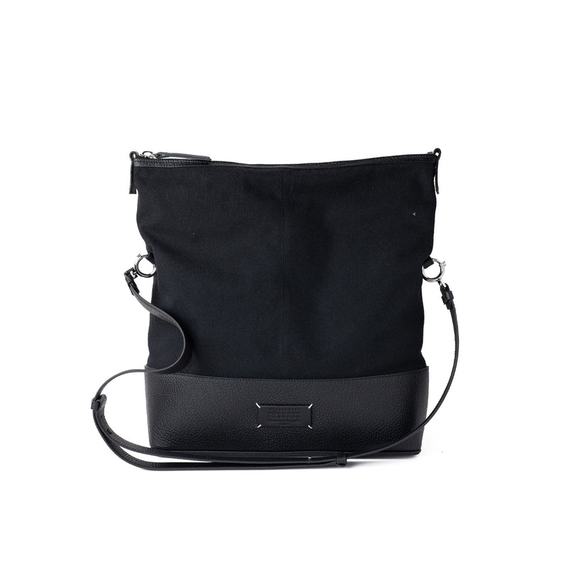 Black shoulder bag on a white background