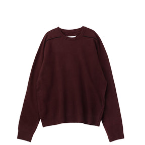Burgundy sweater on a white background