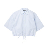 Light blue button-up shirt with a tie at the waist on a white background