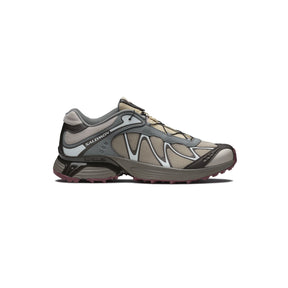 Salomon running shoe on a white background