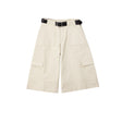 Beige wide-leg pants with a belt on a white background