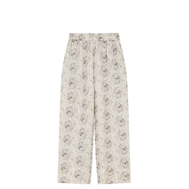 Floral patterned pants on a white background