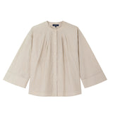 Beige shirt on a white background