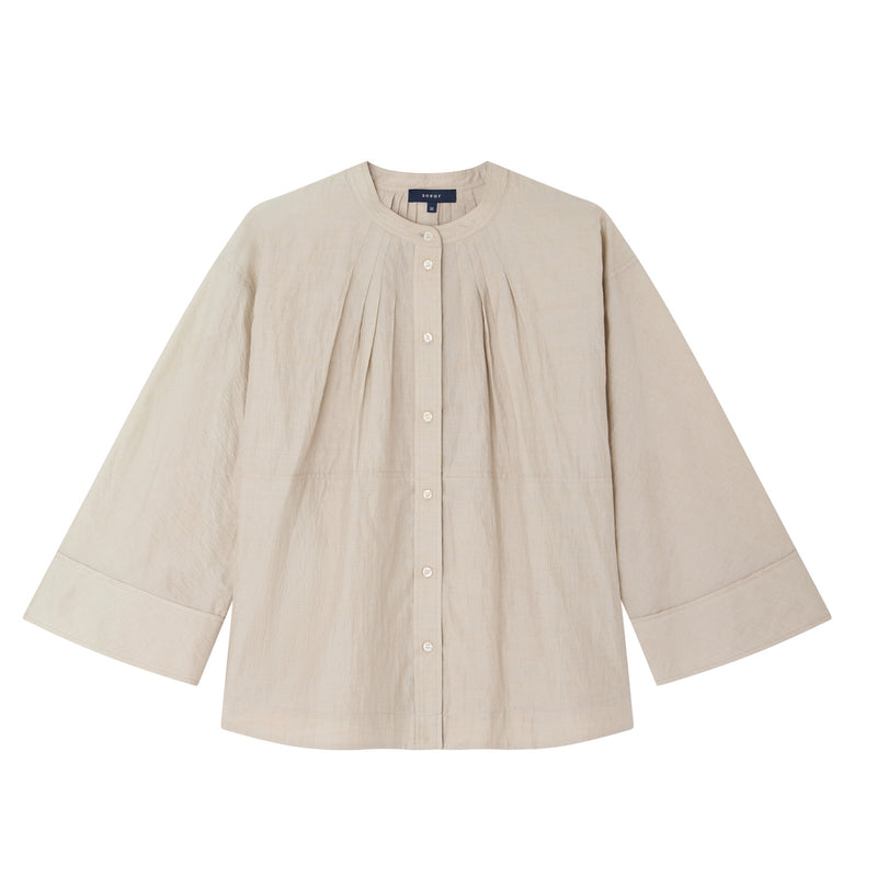 Beige shirt on a white background