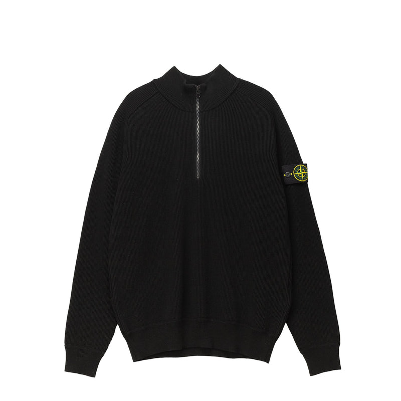 Black sweater with a brand logo on the sleeve against a white background