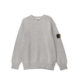 Gray sweater with a brand label on a white background