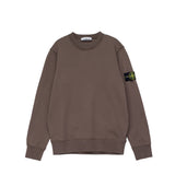 Brown sweatshirt with a logo on the sleeve against a white background