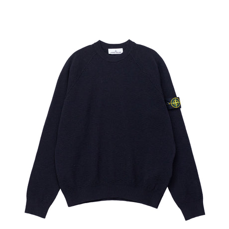 Black sweater with a brand logo on the sleeve against a white background