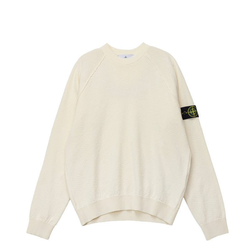 Ivory sweater on a white background