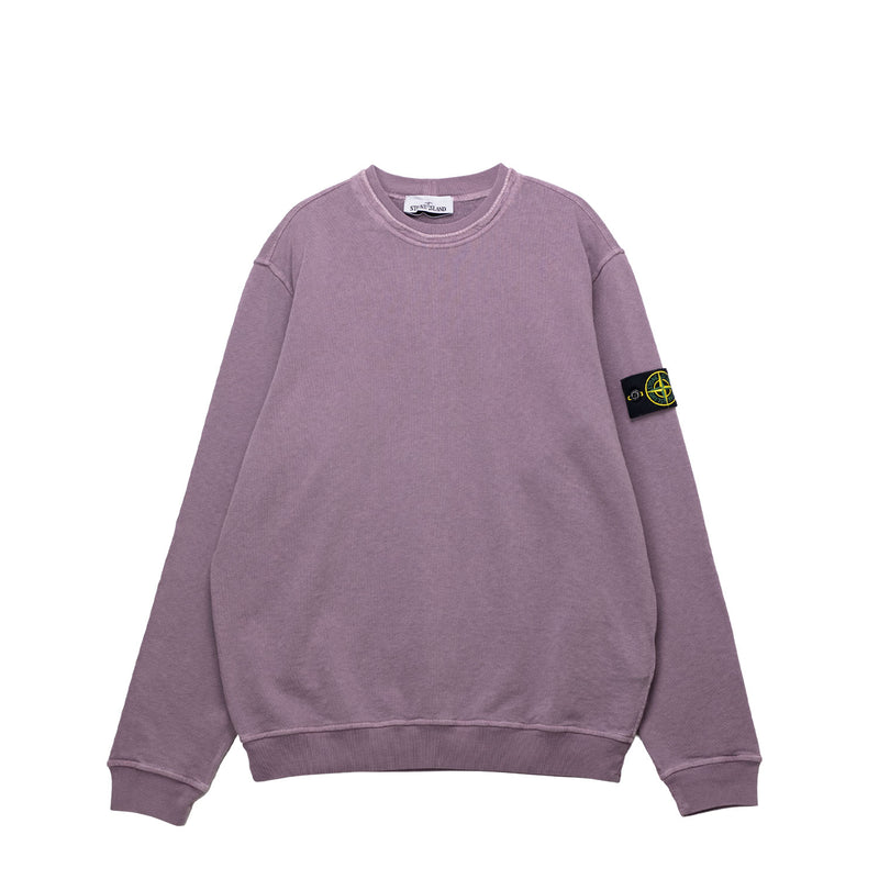 Purple sweatshirt with a brand logo on the sleeve against a white background