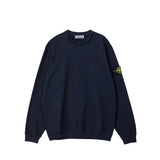 Navy blue sweatshirt with a yellow logo on the sleeve against a white background
