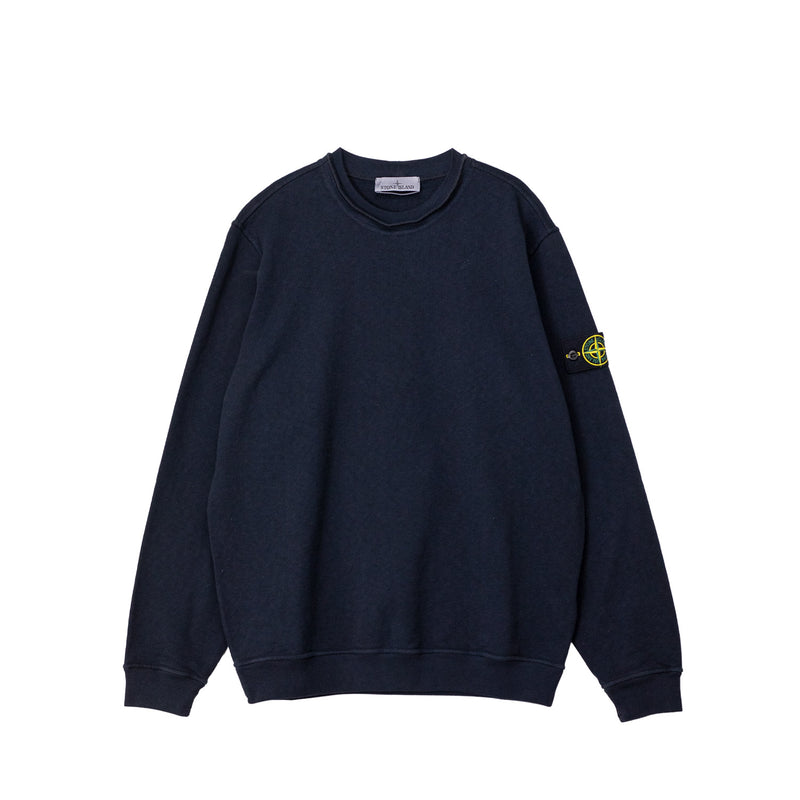 Navy blue sweatshirt with a yellow logo on the sleeve against a white background