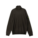 Green turtleneck sweater on a white backgorund.