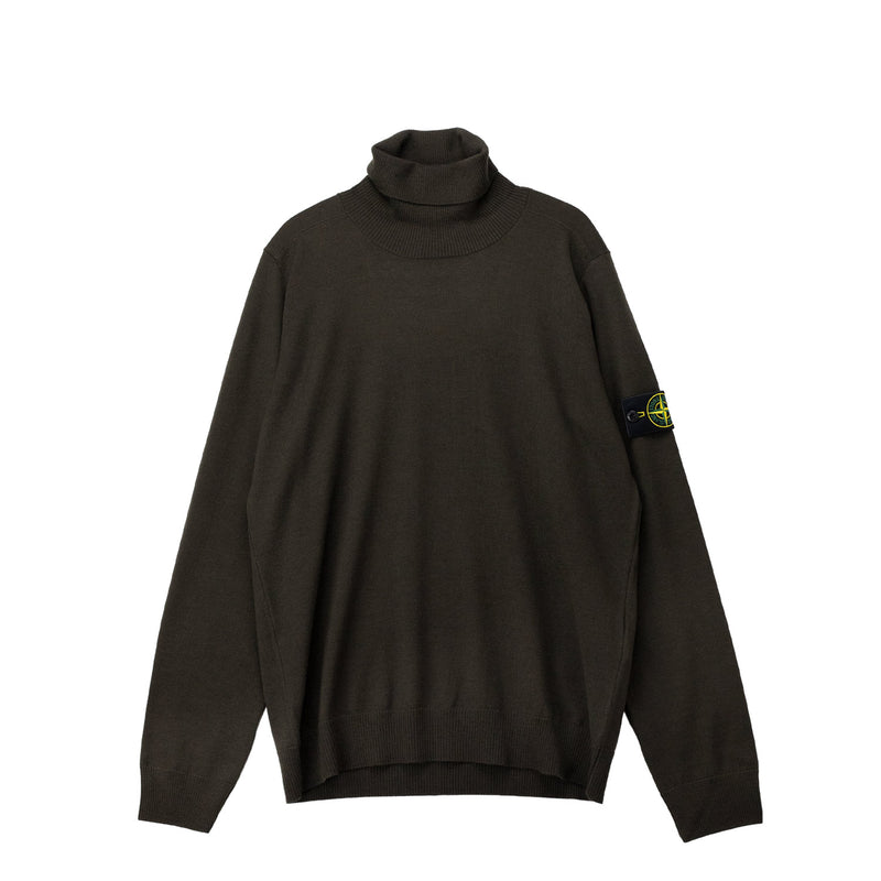 Green turtleneck sweater on a white backgorund.
