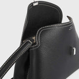 TOTEME T-LOCK GRAINED-LEATHER CLUTCH, Black