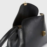 TOTEME T-LOCK LEATHER CLUTCH, Black