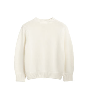 cream sweater on a white background