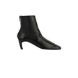 A single black leather ankle boot with a pointed toe and a short kitten heel, shown from a side profile on a plain white background.