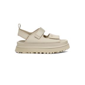 Beige sandal with thick sole on a white background