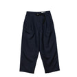 Dark blue pants with a belt on a white background