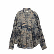 Floral patterned shirt on a white background