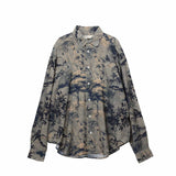 Floral patterned shirt on a white background